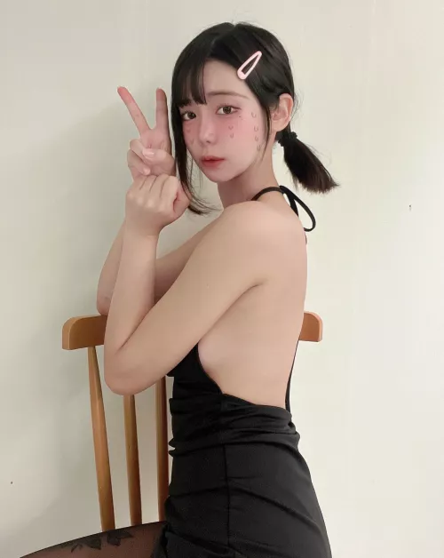 The way this black dress complements my skin tone is appealing, do you agree? by Minimum-Fisherman142