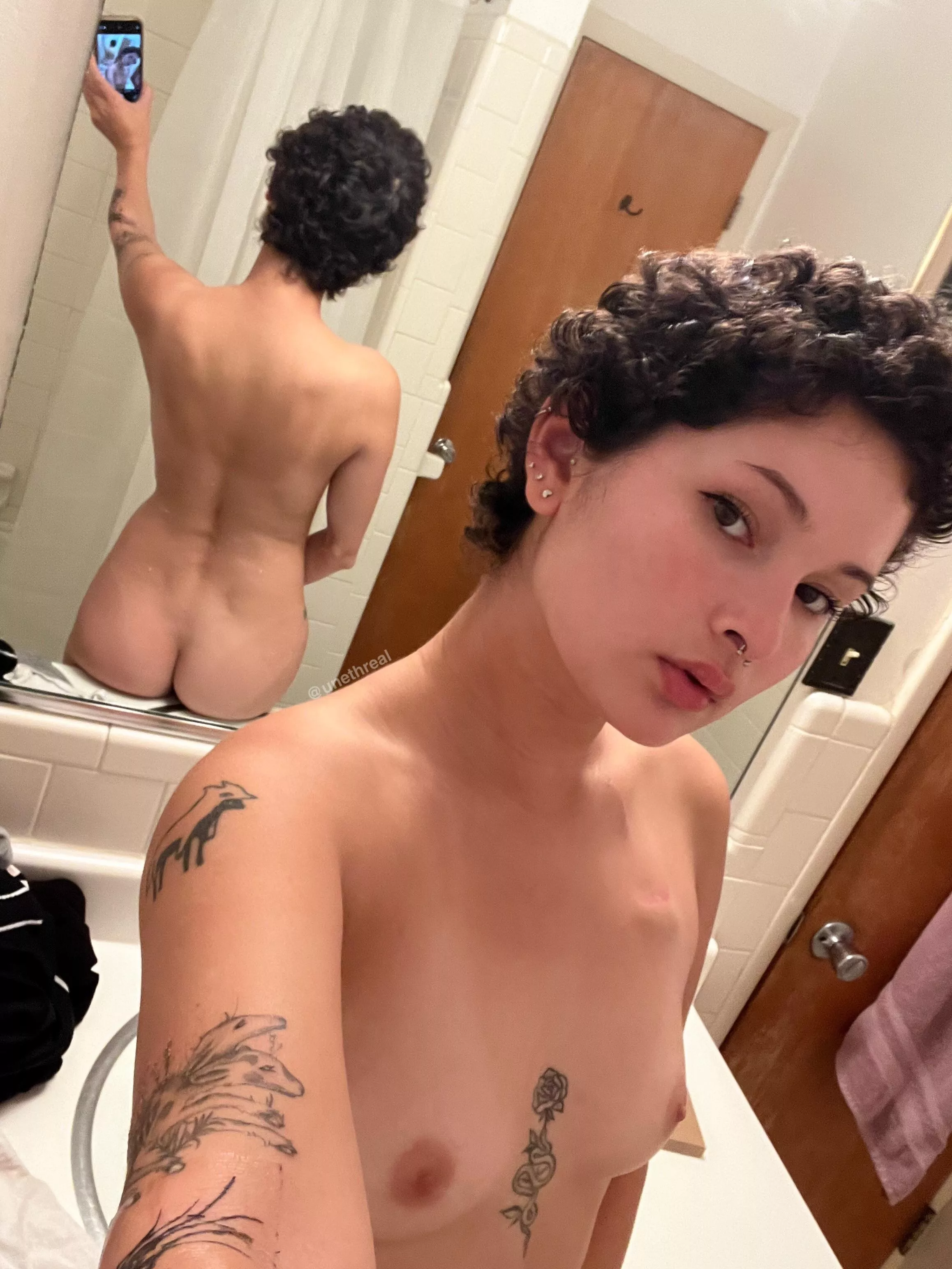 Ended up with these beautiful (and unruly) curls after chemo made my hair fall out… wanna run your hands thru them? 😏 posted by unethreal