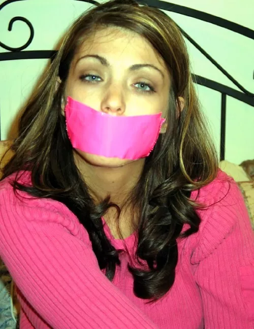 I love matching colors, my pink tape gag looks good with matching sweater by monicassexyfeet