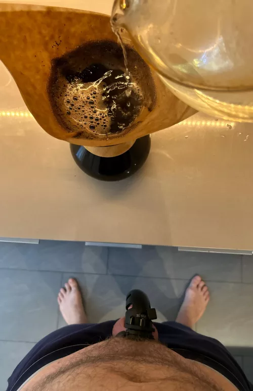 Making her coffee by bisubsual