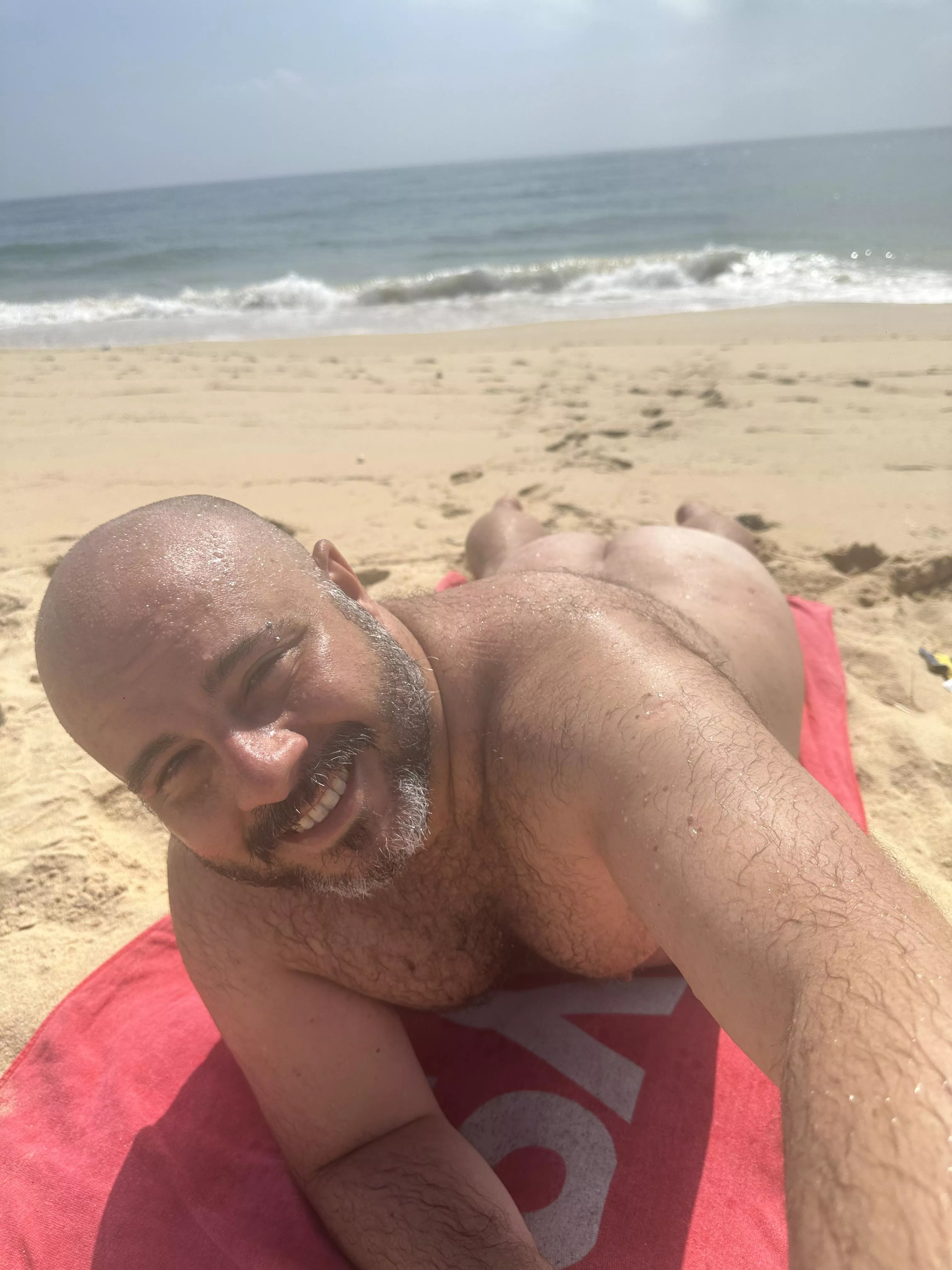 Thanks for all the love guys. Here’s a photo of me at a nude beach in Portugal after doing Sitges Bear Week. posted by No_Dot_7792