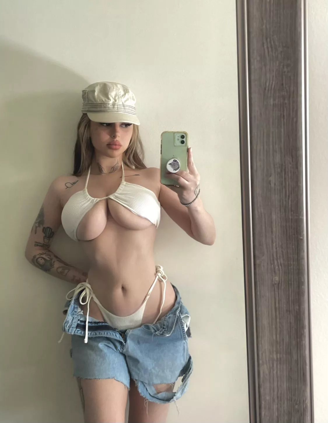 With hats and ripped jeans posted by Sandman-734