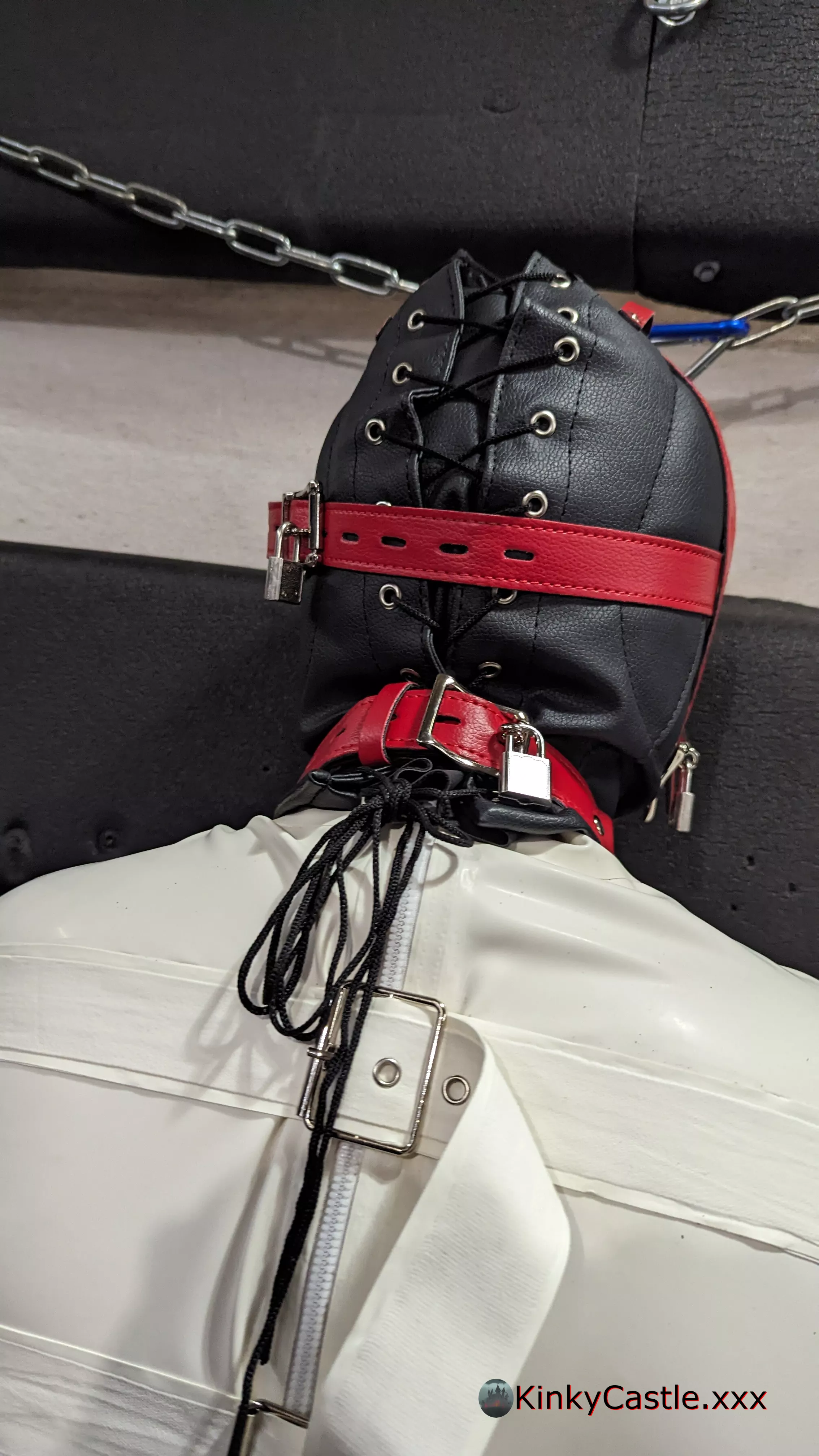 Padlocked in a sensory deprivation hood, with a latex straightjacket. [OC] [NB] [CC-SA] posted by Ash_577474