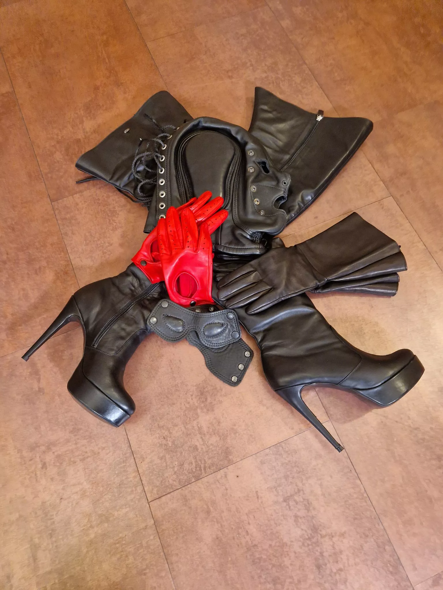 After a hot leather boot and glove fetish session posted by LuxuriousSins