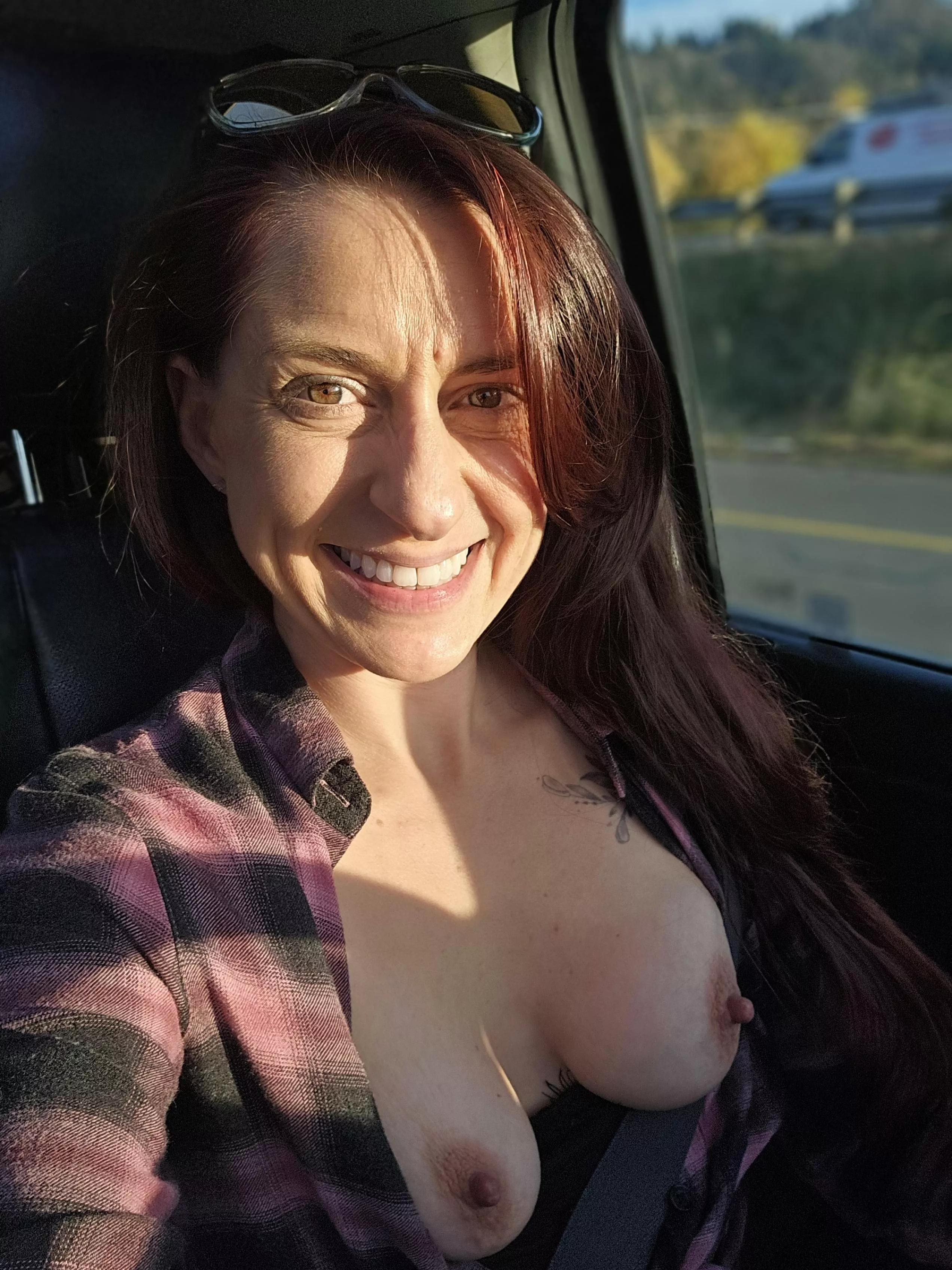 Flannel on, tits out posted by Booty1020