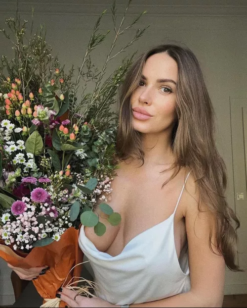 Flowers and cleavage by [deleted]
