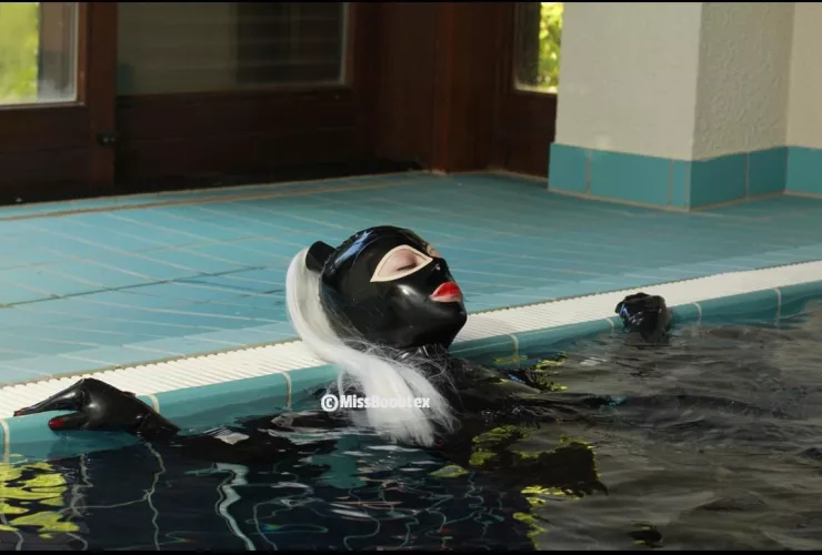 Swimming in latex by MissBoobtex