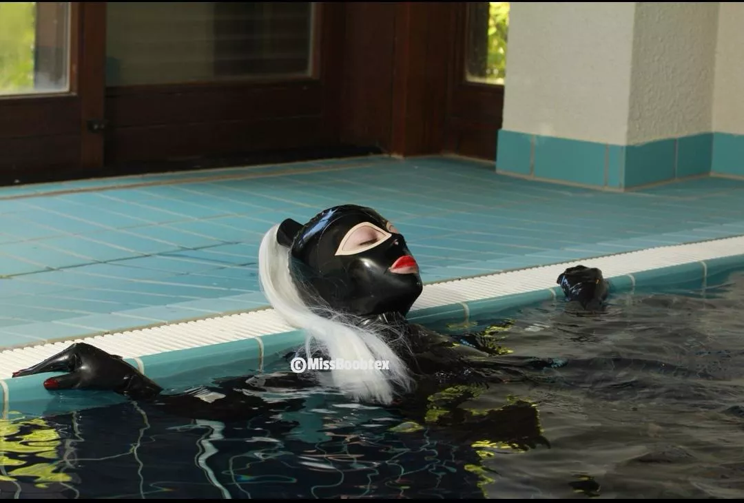 Swimming in latex posted by MissBoobtex