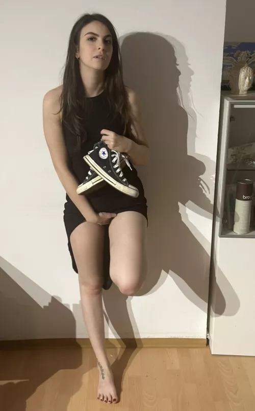 It starts to rain just when I pick up my chucks by Firm-Image