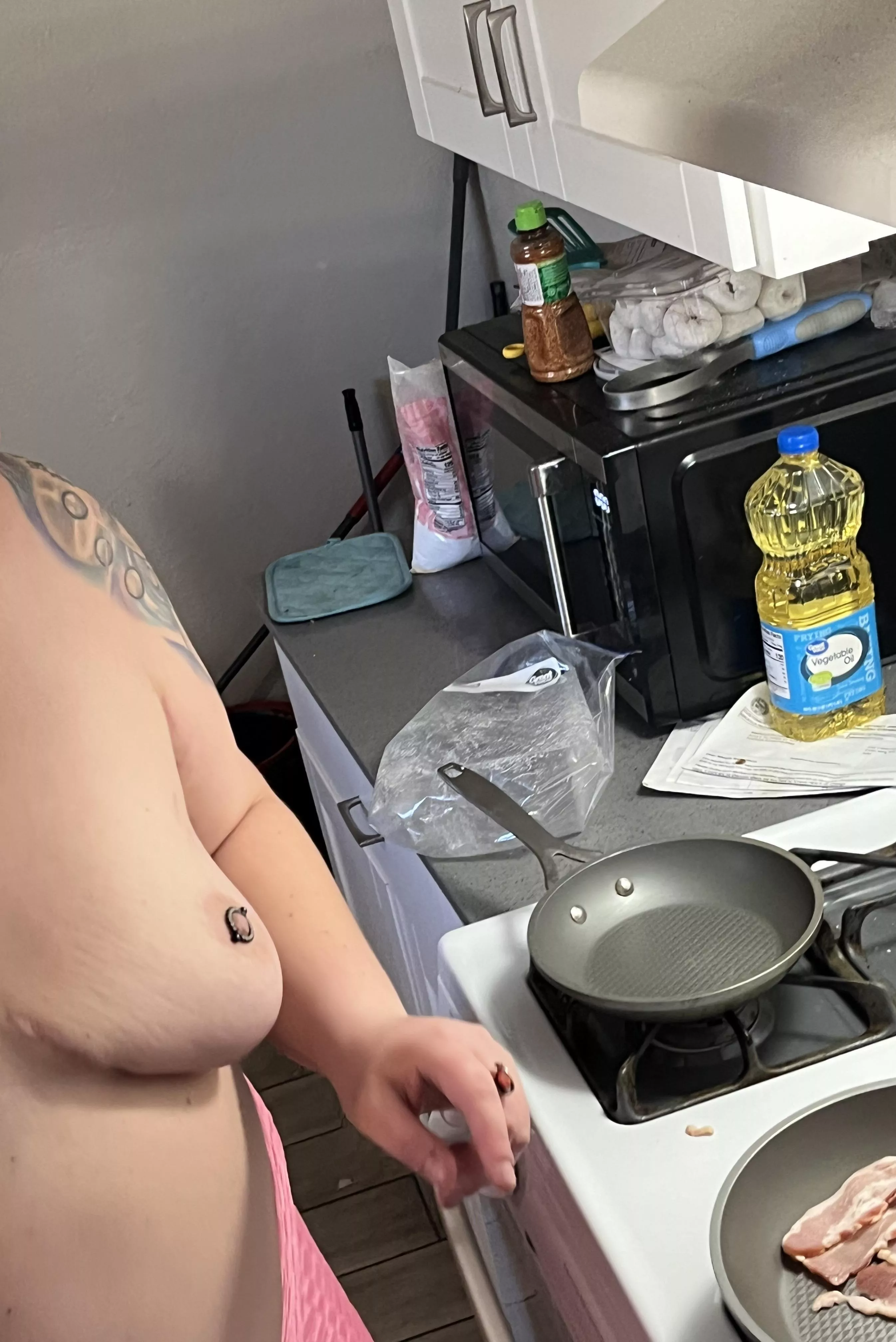 Titties out while cooking breakfast posted by macockkk