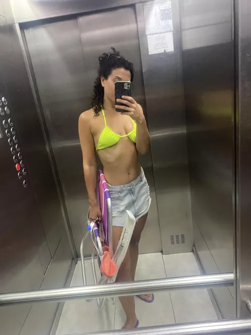 In the elevator Going to the terrace in my bikini by bruja_bruta