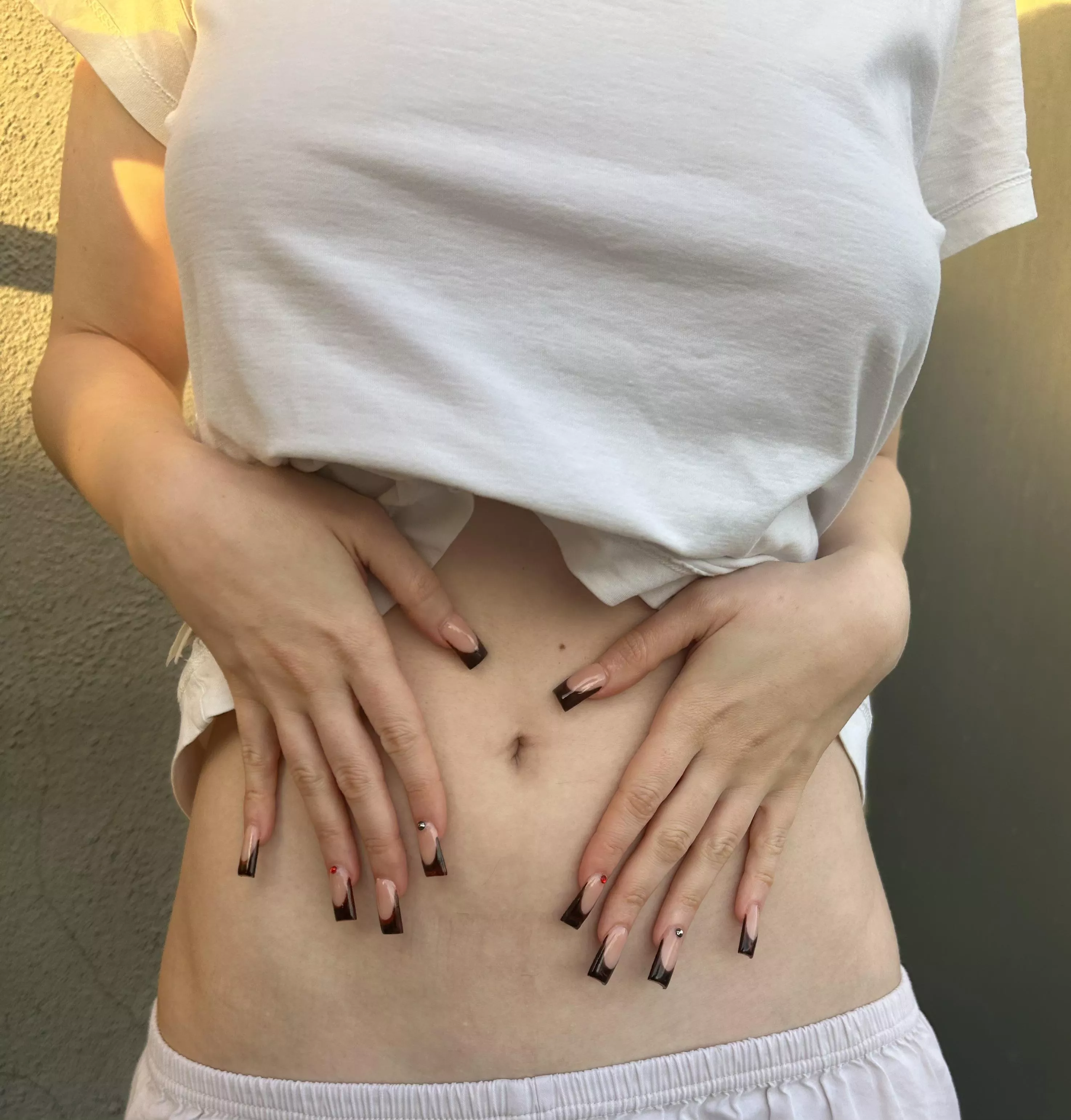 The great feeling of touching my skin with the tip of my new nails! posted by Sunnysinful2000