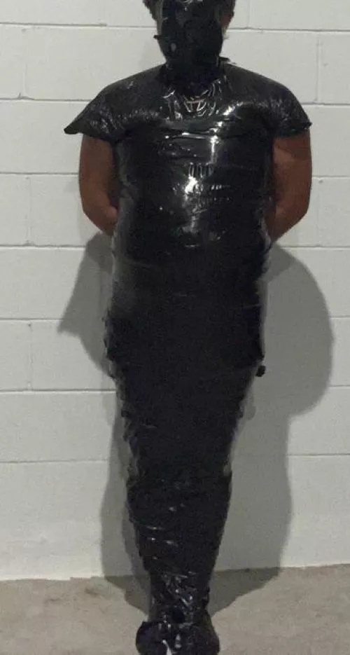 Mummified in black tape by homeboundboy