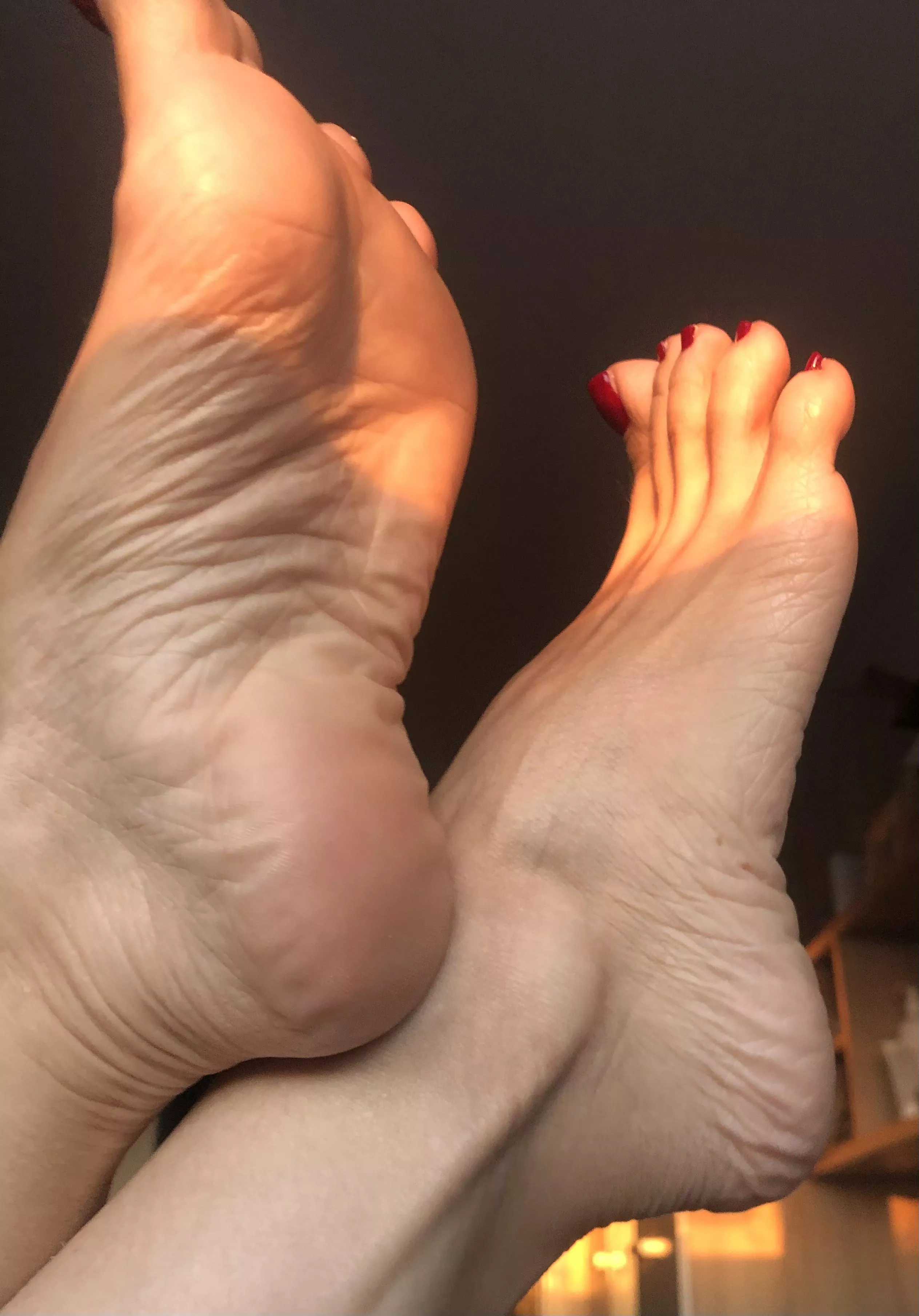 My feet and the glare of the sun's rays posted by albastoes