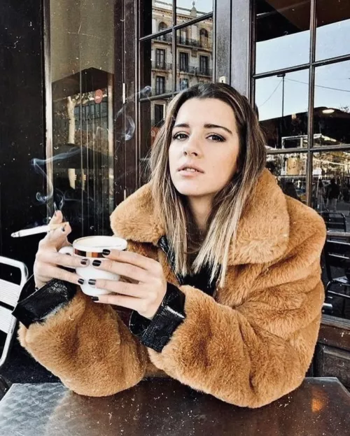 You love how her coat carries the scent of her cigarettes throughout the day by darkpoetries