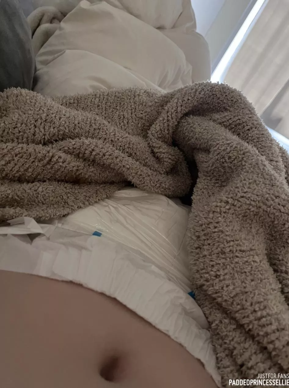 hiding my very full diaper under the blankets 🙈 posted by southernbbybelle