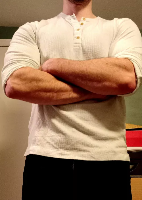 Strong forearms in a tight Henley shirt is a nice combo. by potatoe1987