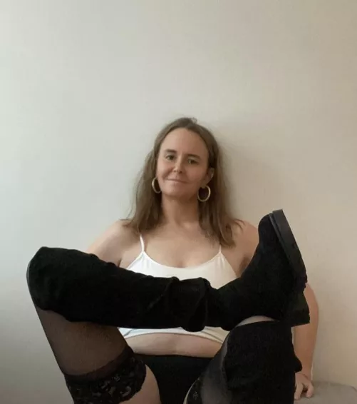 Happy sitting here in my thigh highs and tall boots by LadyLongToes686