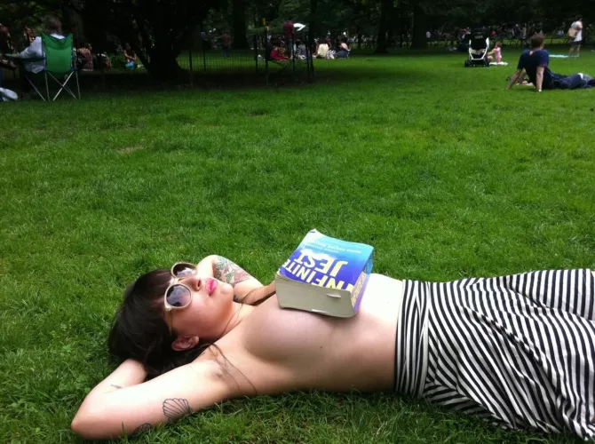 Reading in the park by MyMajesticLodestone