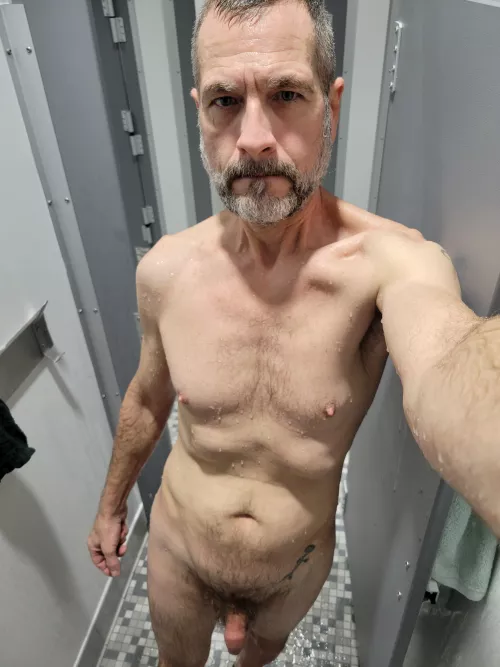 Showering with the door open so the guys at the gym can get a look. by cut_restored