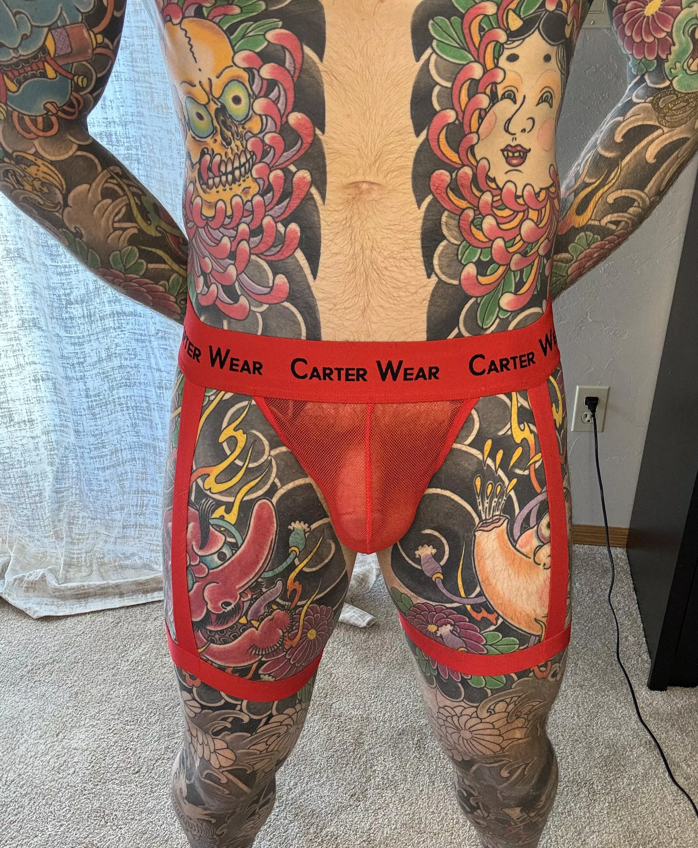 Jock with garters? I think I like it! posted by onebigtattoo