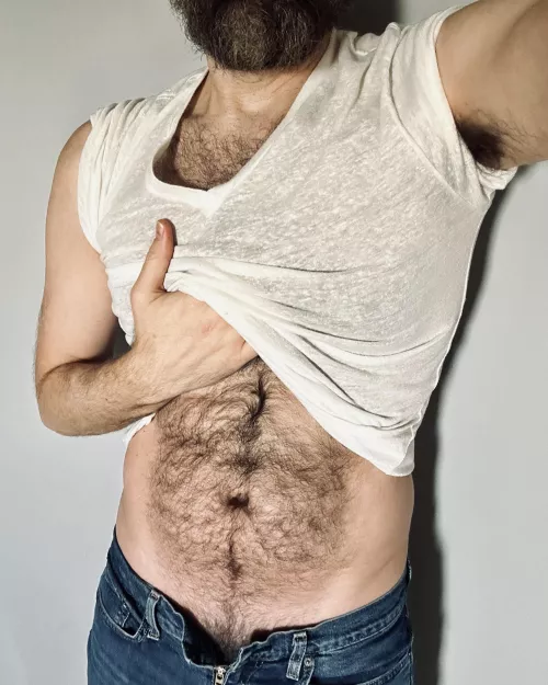 You never know what a bloke's hiding under his shirt... by jerseyjaxoff