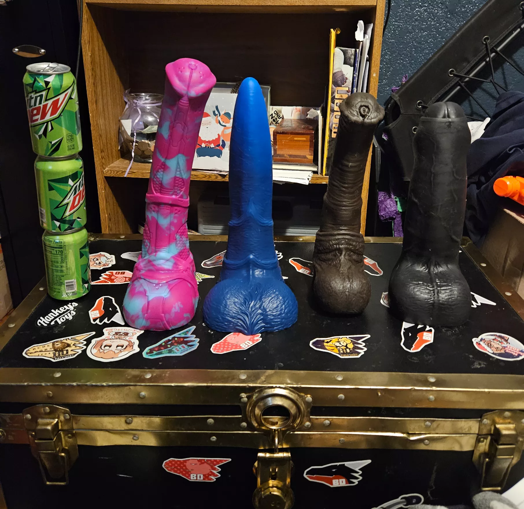 The 4 biggest boys of my 20 toys. 3 soda cans stacked for size reference. yes i can sheath all 4 of them Ask me anything. i give anal size queen advice. posted by crimsonfox1