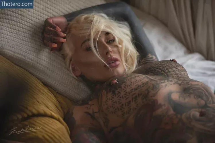 all tits must have tattoos and piercings on them by armin_malek