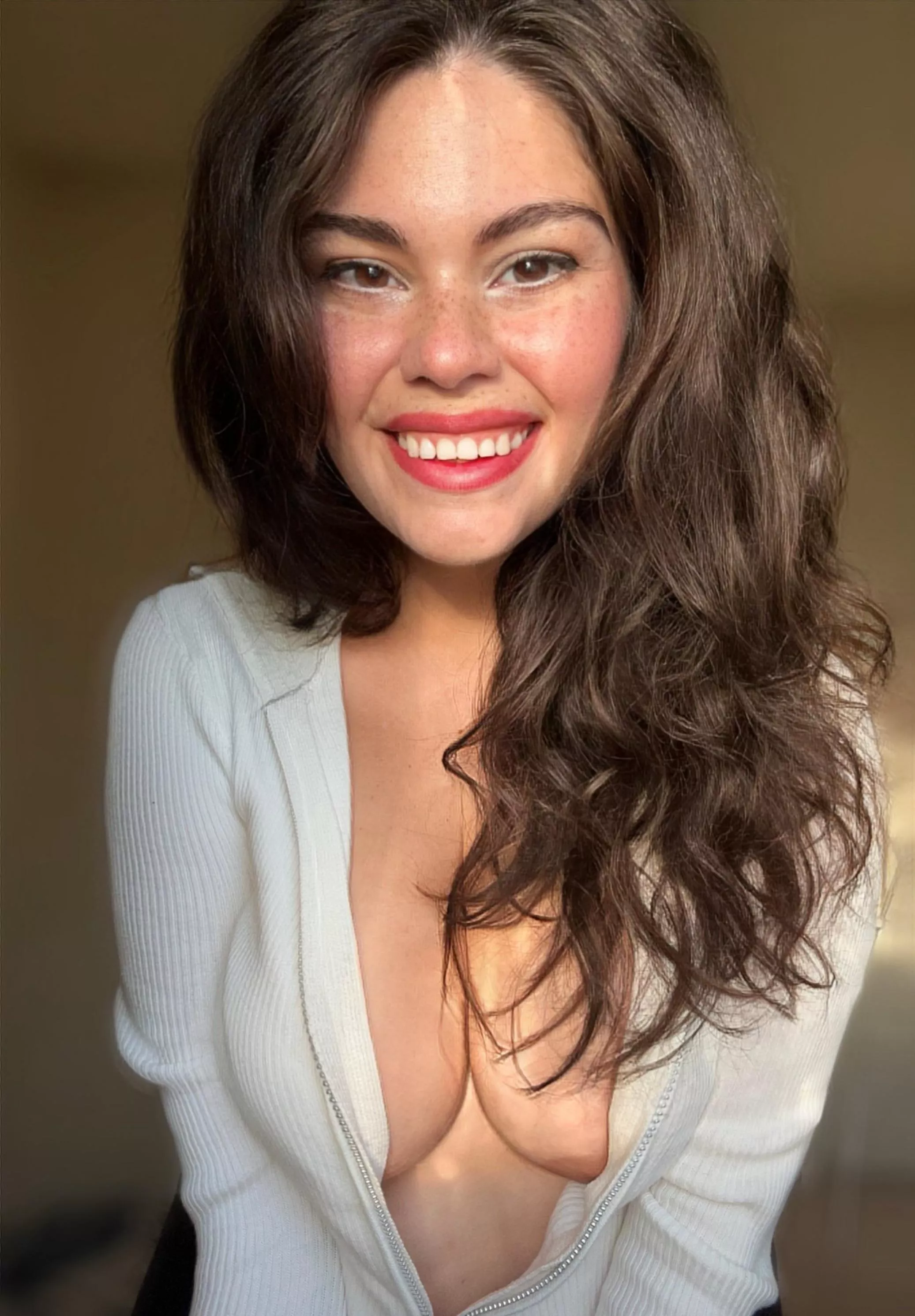 Freckles, smile, and a nip slip posted by mollyzedolly