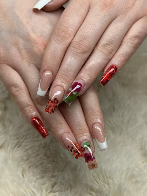 Getting ready for Valentine’s Day. I just love how delicate my fingers look. 😈 by Fae_Willow