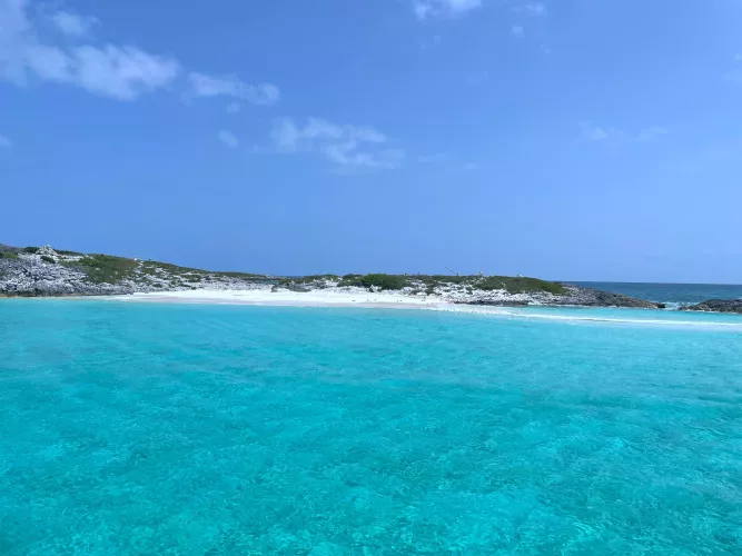 A little beach and some blue water for your Wednesday! by Admirable-Boat-5318