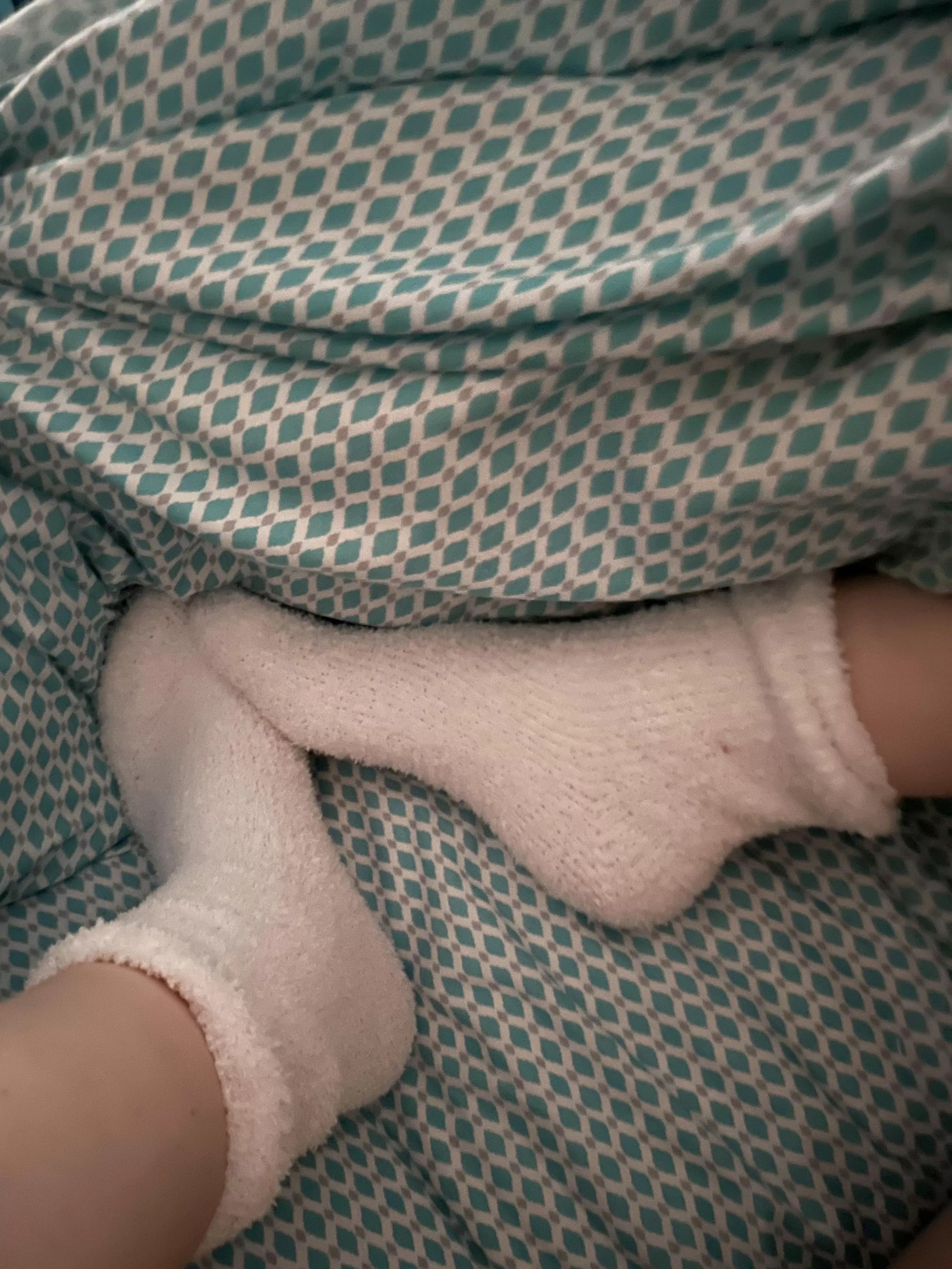 In bed with my fuzzy socks. Keep them on or peek under? posted by MilkyAffection