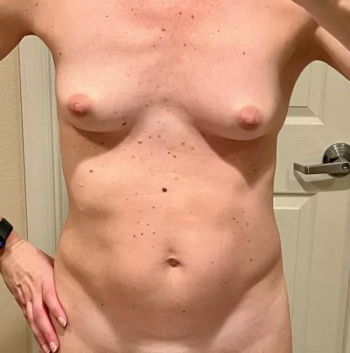 Slightly sunburned tiny MILF tits. No tan lines.. by fansforfitnessnw