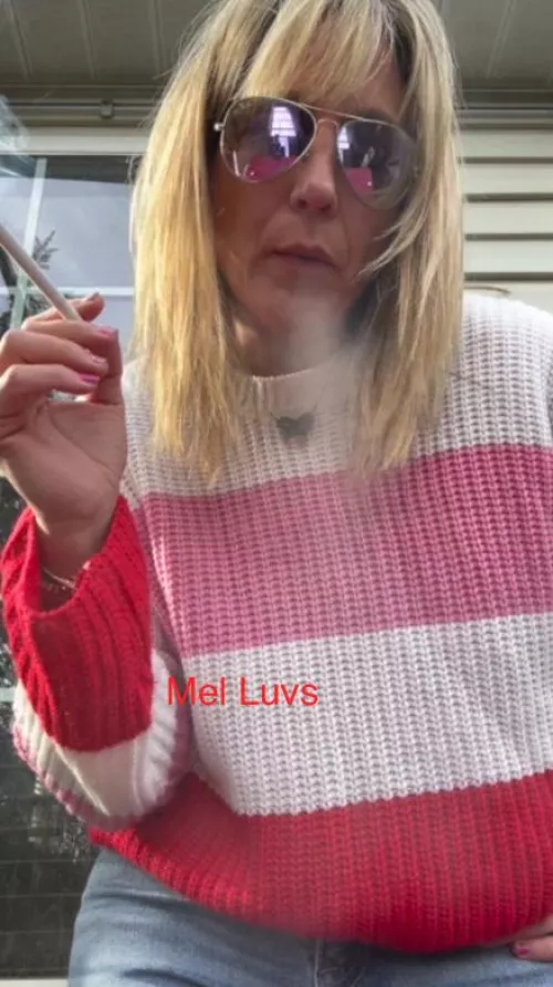 Cougar got bangs.....and blowing smoke right at you..... by melluvsitall