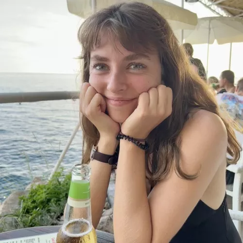 Pretty girl having a drink by the water by TheLateQE2