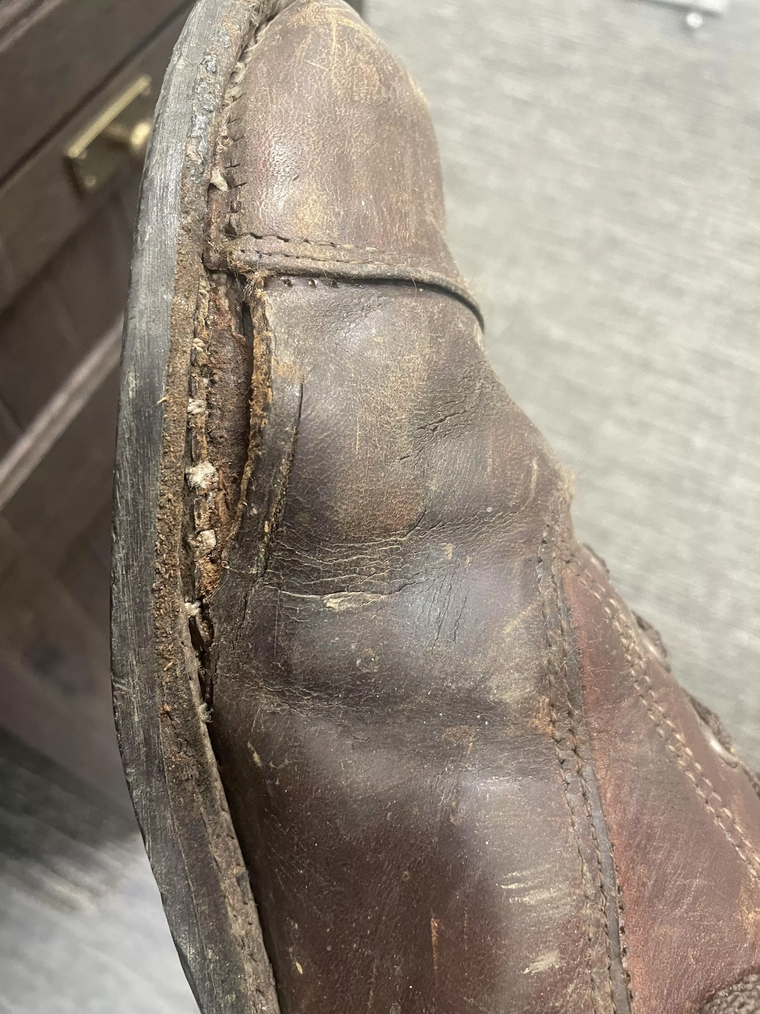 1,000 Mile Wolverine’s. On 3rd or 4th resole after 11+ years, but new hole. Is this repairable. posted by liarliarplants4hire
