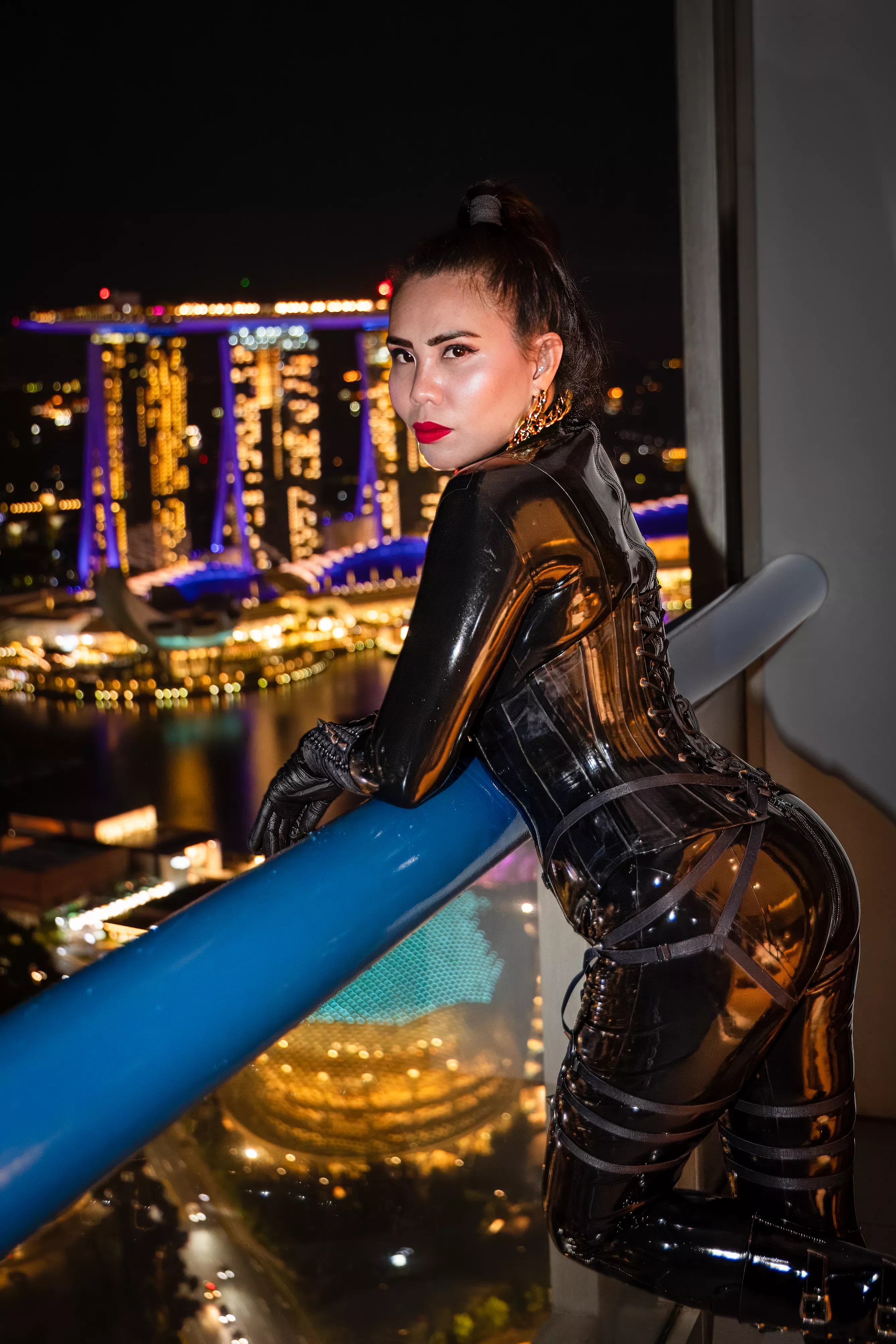Wearing my Latex on the Balcony 😊 posted by Domina_Fire