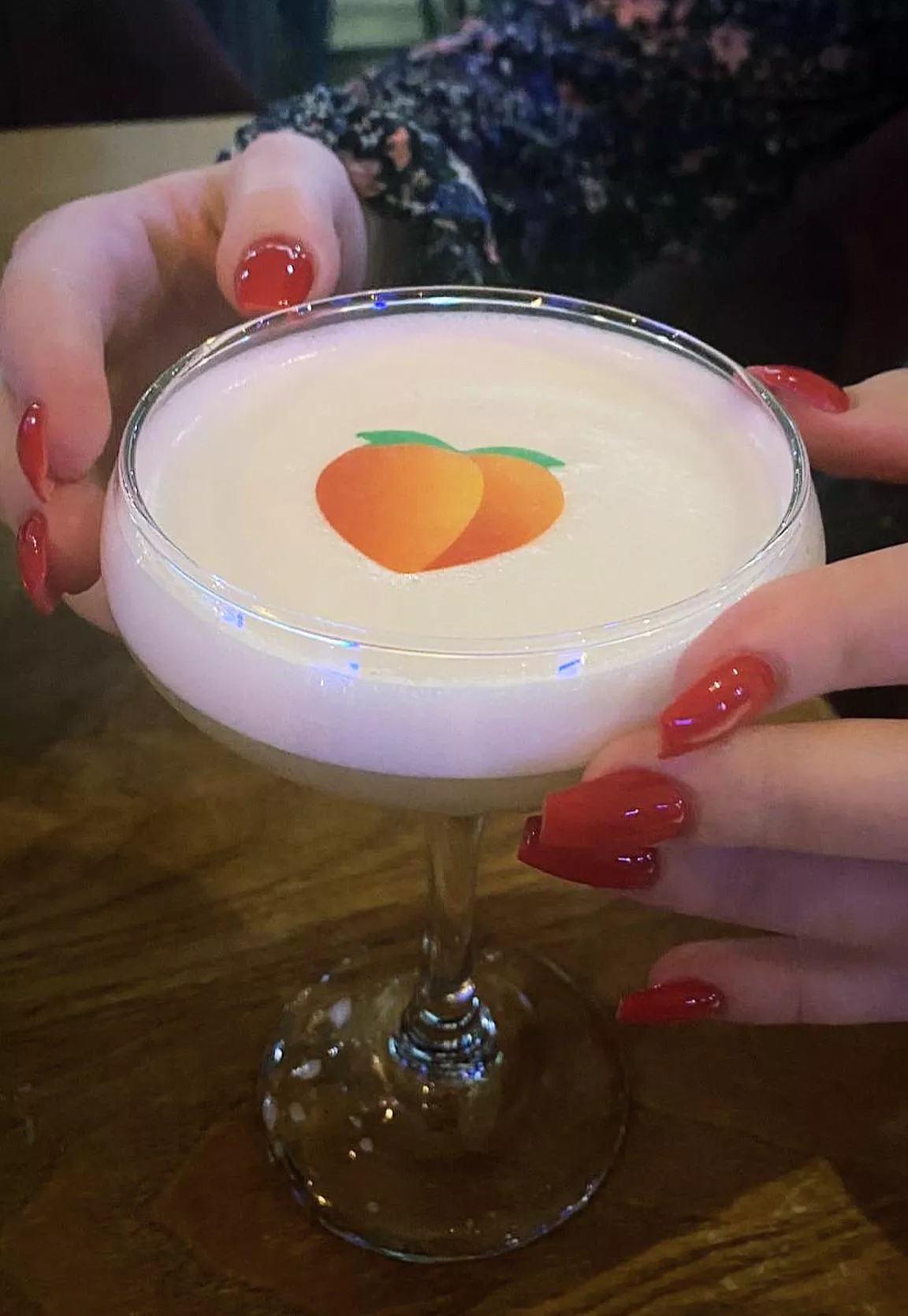 Red nails and a peach 🍑 posted by orvilina