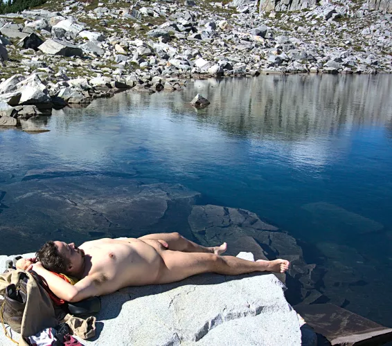 Warming up in the sun before a alpine lake swim by CascadesNaturist