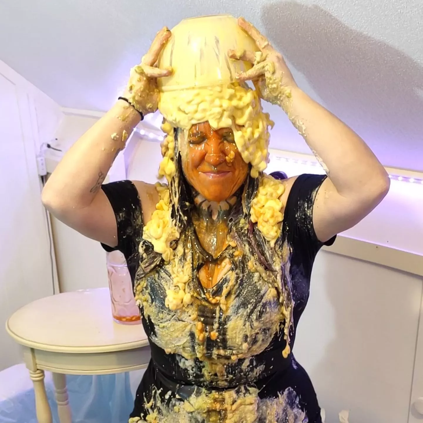 Emptying a bowl of mac and cheese on her head posted by _Anonymous_Account_