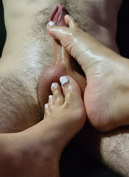 I love squishing his balls until they get completely empty...🥵🦶 by bunnyannie69