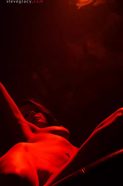 Rose in red light by SteveGracyPhoto