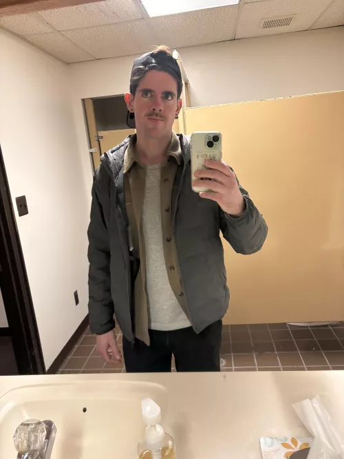 Wearing the stache and enjoying a small concert. 🎶  by Enough_Ad_2696