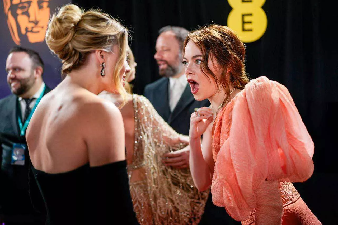 Emma Stone & Margot Robbie posted by HarlequinKing1406