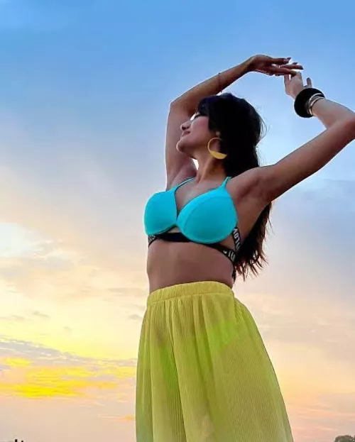 Hi everyone see my wife she is in sea beach and desperately showoff wearing these dress . Why she is doing it can anybody tell me by fapperofnusrat