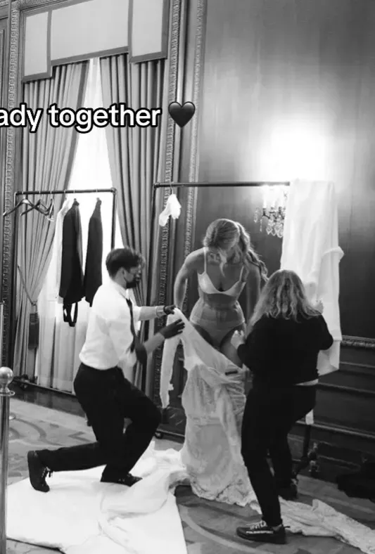 Model Kate (Bock) Love getting dressed on her wedding day via her TikTok posted by GreyTemples1972