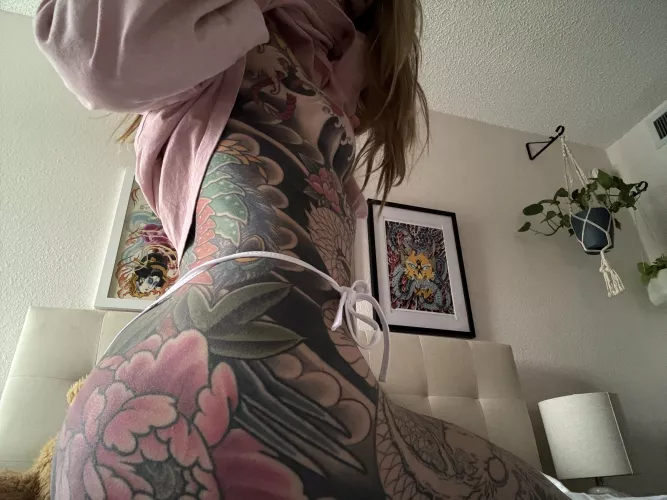 Blonde and heavily tattooed  by kuzagirl