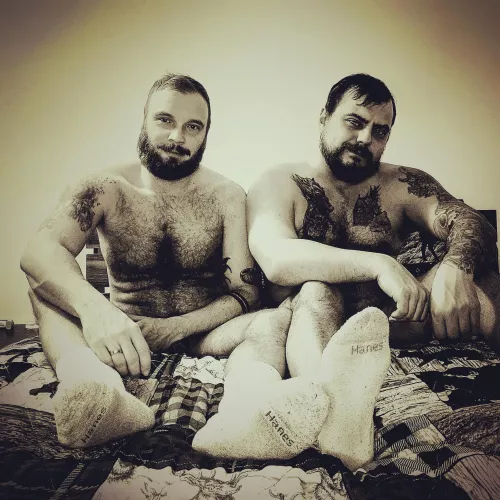 Furry otter and his bear hanging out in bed by LucasHardwood