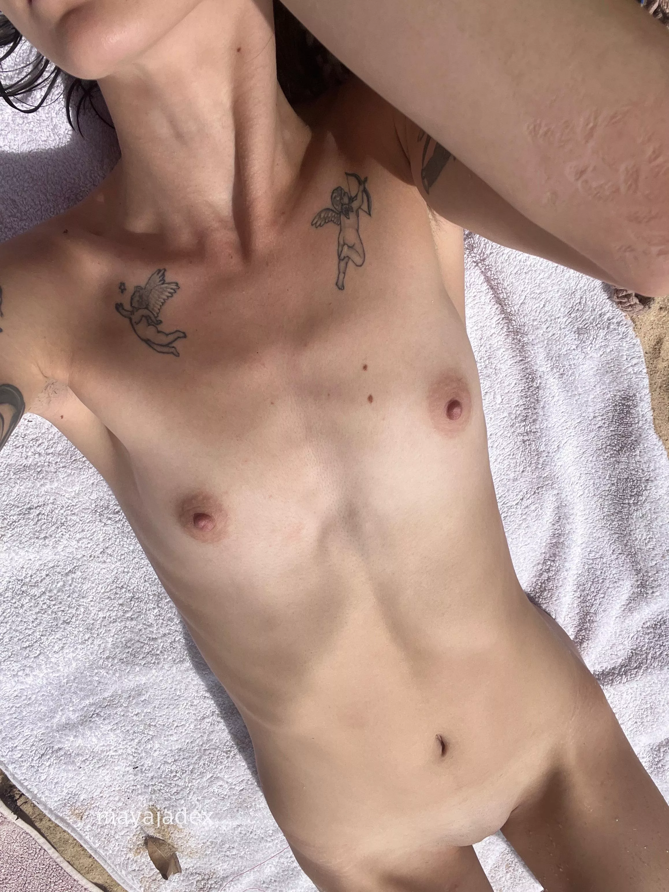 getting some sun on my flat chest :)) posted by mayajadex