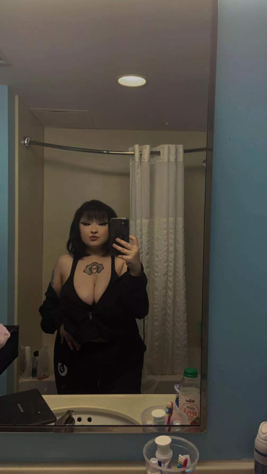 mirror selfie 🖤 posted by g0thmxlf